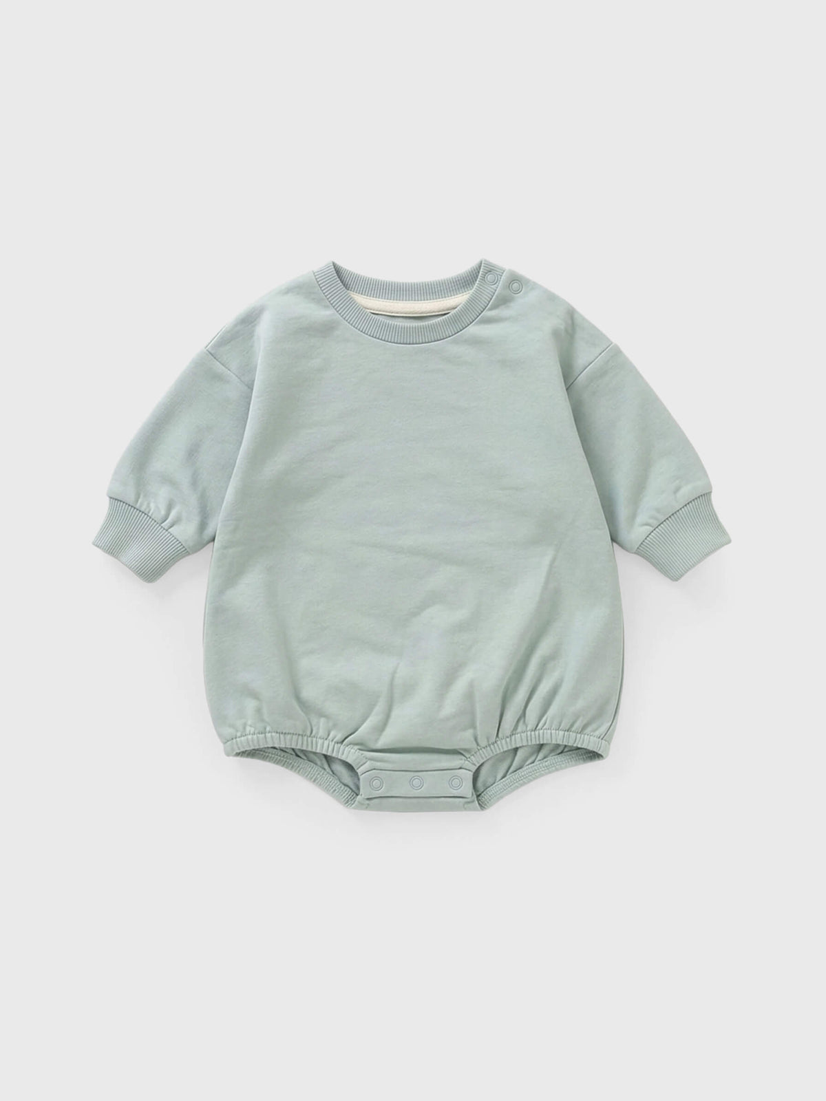 Soft olive baby romper on a white background