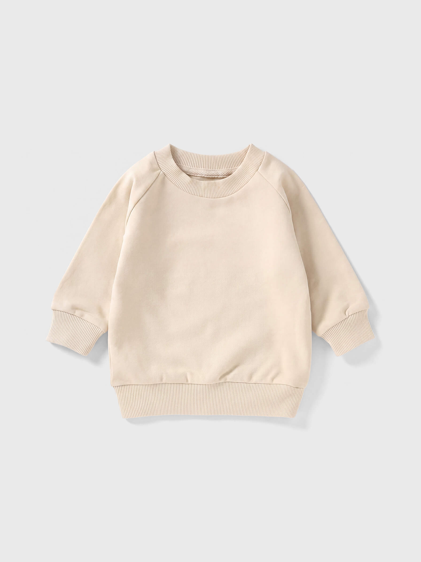 Beige sweatshirt on a light gray background